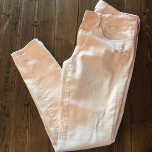 Light pink distressed AE jeggings
